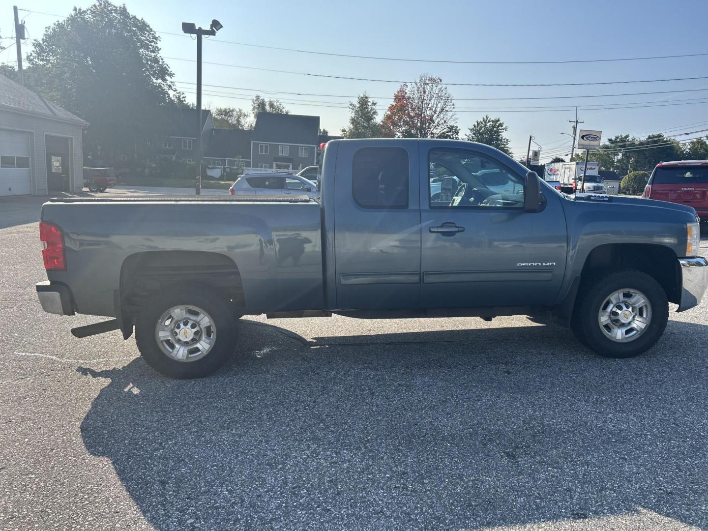 2010 Blue /Tan Chevrolet Silverado 2500HD LTZ Ext. Cab 4WD (1GC5KYBG8AZ) with an 6.0L V8 OHV 16V FFV engine, 6-Speed Automatic transmission, located at 27 Main St., Norway, MD, 04268, (207) 743-0900, 44.199795, -70.530807 - Photo#3