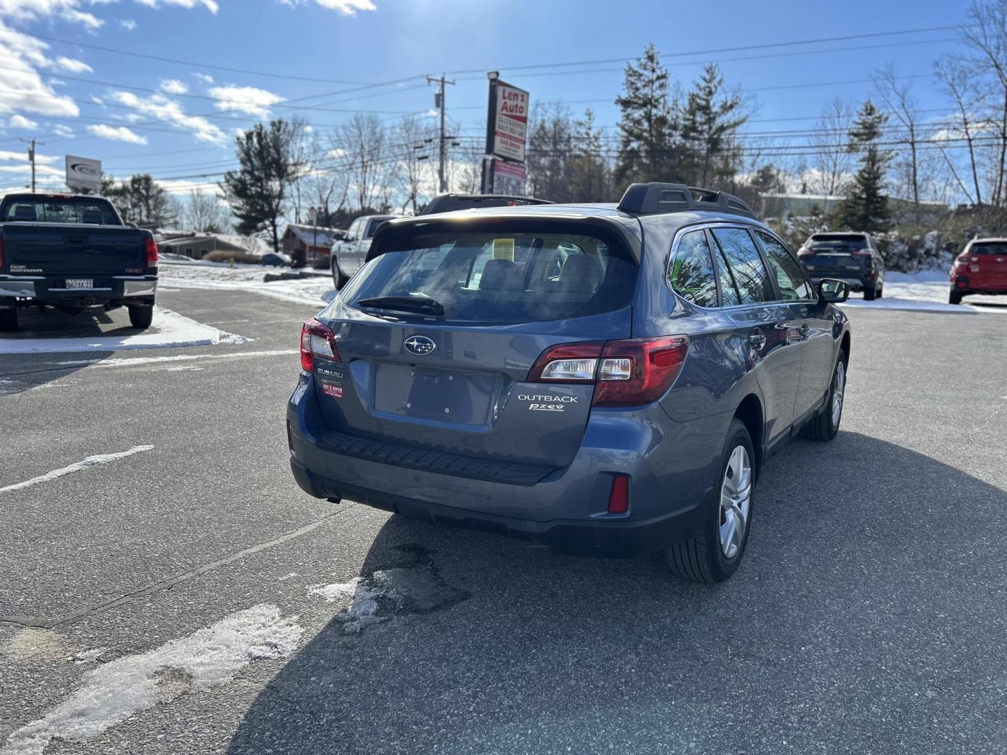 2015 BLUE /Tan Subaru Outback 2.5i (4S4BSAAC9F3) with an 2.5L H4 DOHC 16V engine, 6-Speed Automatic transmission, located at 27 Main St., Norway, MD, 04268, (207) 743-0900, 44.199795, -70.530807 - Photo#2