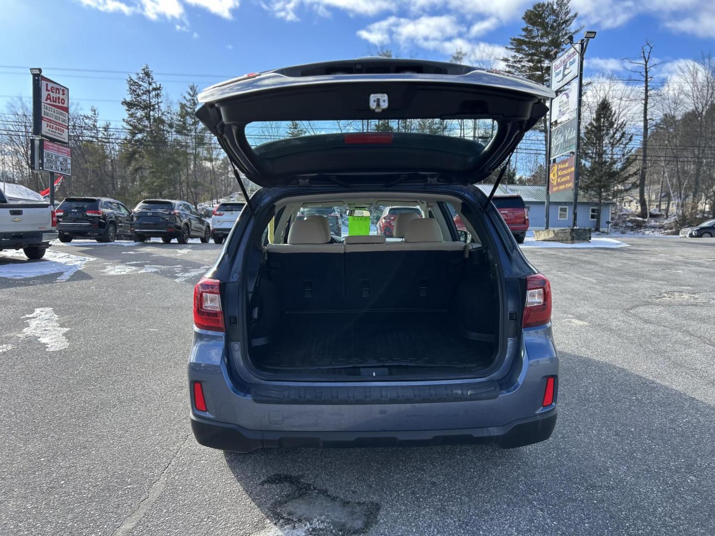 2015 BLUE /Tan Subaru Outback 2.5i (4S4BSAAC9F3) with an 2.5L H4 DOHC 16V engine, 6-Speed Automatic transmission, located at 27 Main St., Norway, MD, 04268, (207) 743-0900, 44.199795, -70.530807 - Photo#3