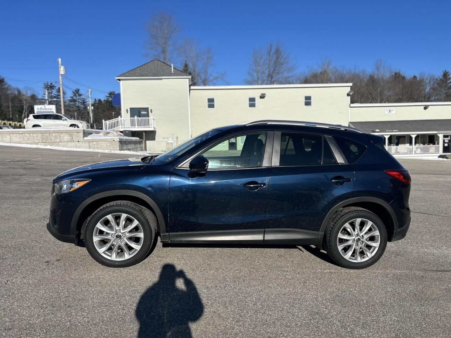 2015 BLUE /Tan Mazda CX-5 Grand Touring AWD (JM3KE4DY2F0) with an 2.5L L4 DOHC 16V engine, 6-Speed Automatic transmission, located at 27 Main St., Norway, MD, 04268, (207) 743-0900, 44.199795, -70.530807 - Photo#1