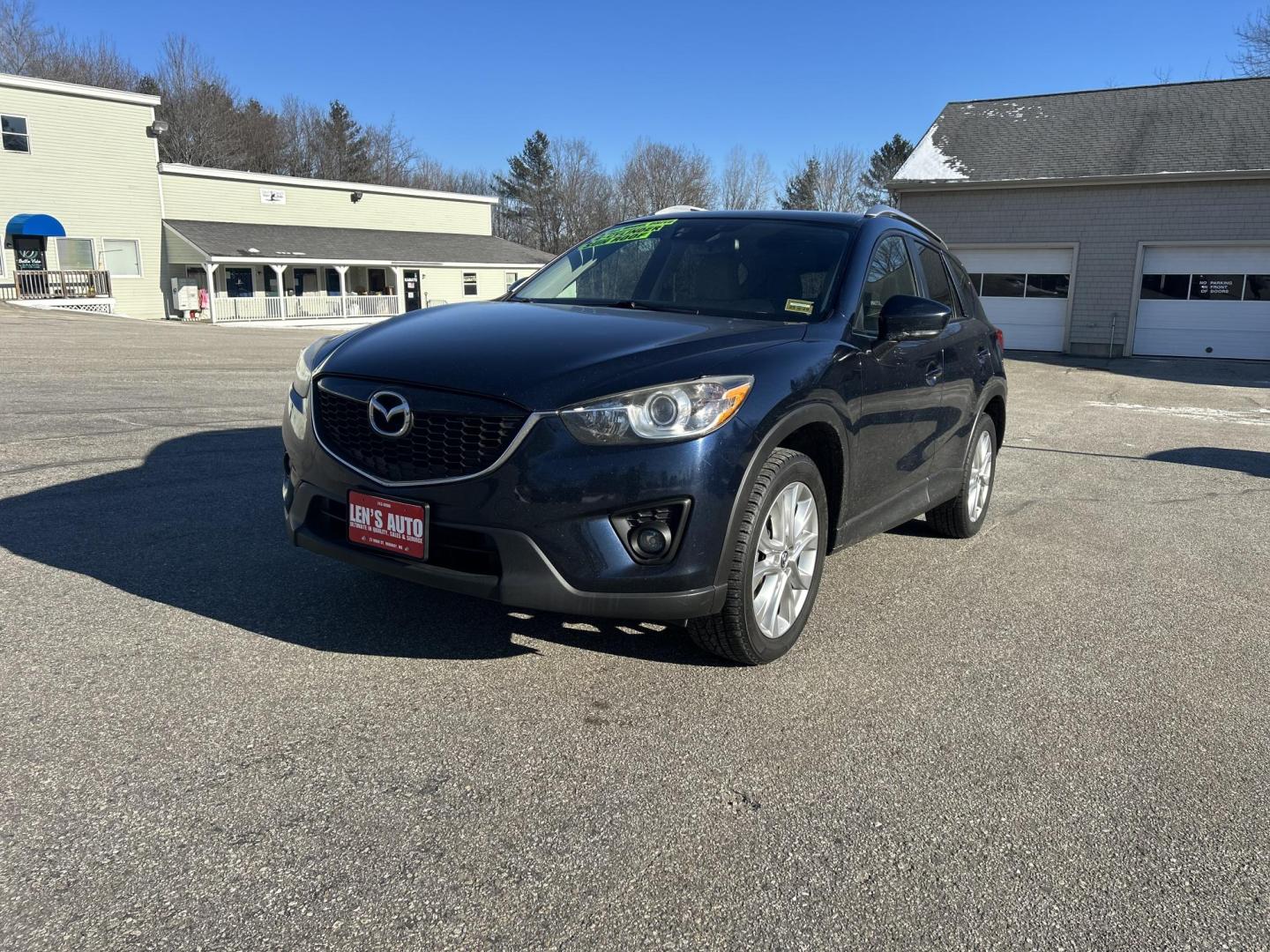 2015 BLUE /Tan Mazda CX-5 Grand Touring AWD (JM3KE4DY2F0) with an 2.5L L4 DOHC 16V engine, 6-Speed Automatic transmission, located at 27 Main St., Norway, MD, 04268, (207) 743-0900, 44.199795, -70.530807 - Photo#0