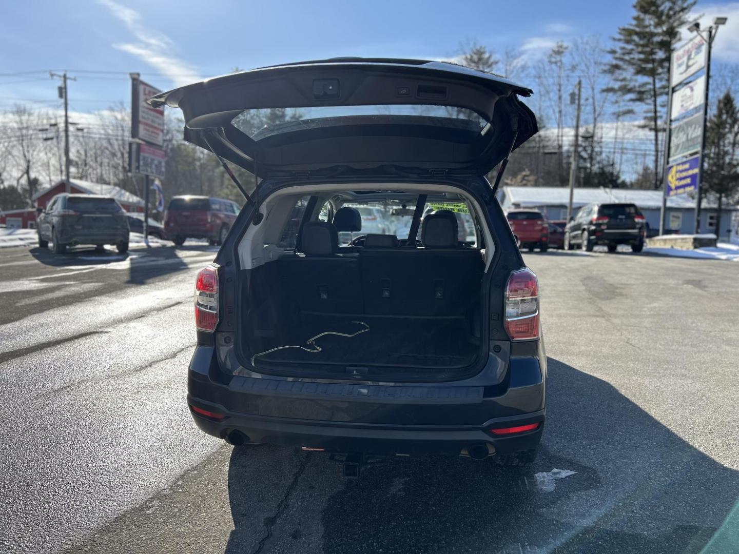 2014 BLUE /Black Subaru Forester 2.0XT Touring (JF2SJGMC5EH) with an 2.0L H4 SOHC 16V engine, 8-Speed Automatic transmission, located at 27 Main St., Norway, MD, 04268, (207) 743-0900, 44.199795, -70.530807 - Photo#9