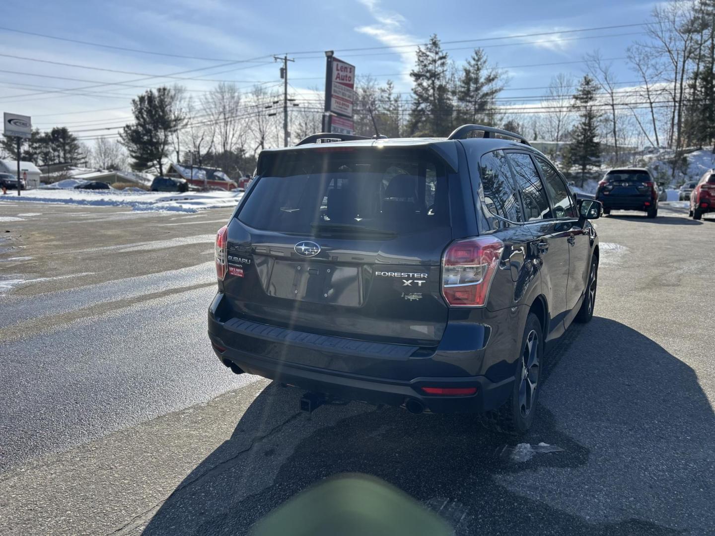 2014 BLUE /Black Subaru Forester 2.0XT Touring (JF2SJGMC5EH) with an 2.0L H4 SOHC 16V engine, 8-Speed Automatic transmission, located at 27 Main St., Norway, MD, 04268, (207) 743-0900, 44.199795, -70.530807 - Photo#3