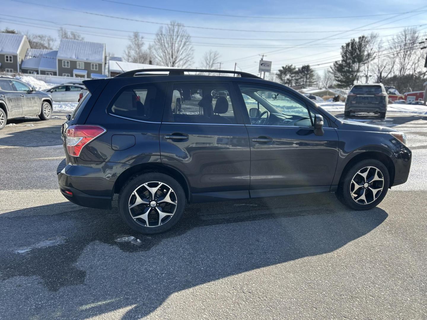 2014 BLUE /Black Subaru Forester 2.0XT Touring (JF2SJGMC5EH) with an 2.0L H4 SOHC 16V engine, 8-Speed Automatic transmission, located at 27 Main St., Norway, MD, 04268, (207) 743-0900, 44.199795, -70.530807 - Photo#2