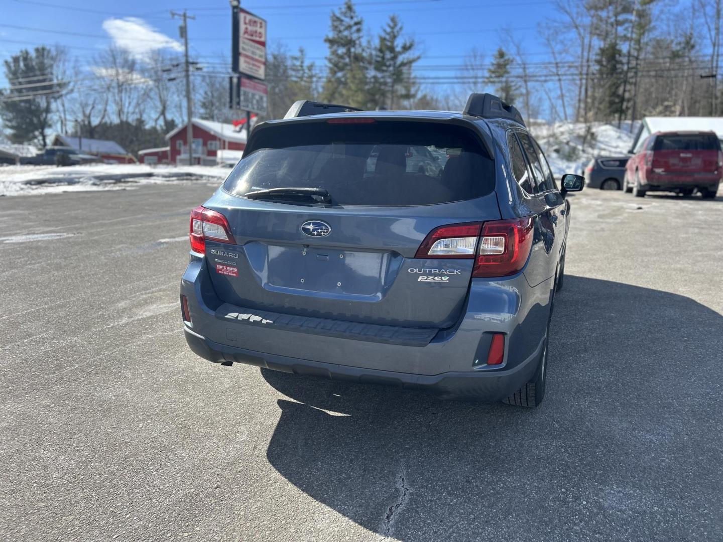 2014 BLUE /Black Subaru Outback 2.5i Premium (4S4BSAFC1F3) with an 2.5L H4 DOHC 16V engine, 6-Speed Automatic transmission, located at 27 Main St., Norway, MD, 04268, (207) 743-0900, 44.199795, -70.530807 - Photo#3