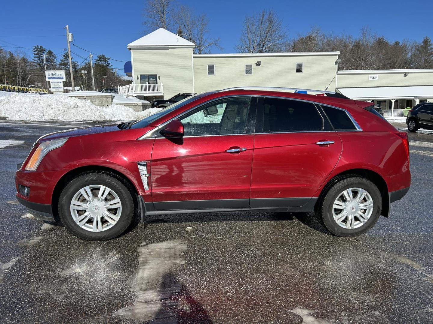 2012 Red /Tan Cadillac SRX Luxury AWD (3GYFNDE37CS) with an 3.6L V6 DOHC 24V FFV engine, 6-Speed Automatic transmission, located at 27 Main St., Norway, MD, 04268, (207) 743-0900, 44.199795, -70.530807 - Photo#1