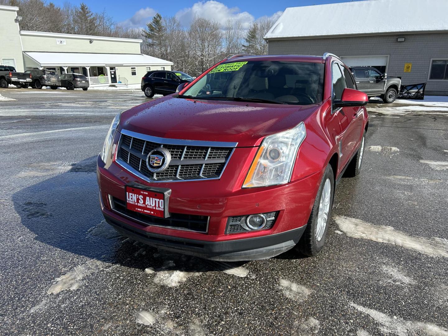 2012 Red /Tan Cadillac SRX Luxury AWD (3GYFNDE37CS) with an 3.6L V6 DOHC 24V FFV engine, 6-Speed Automatic transmission, located at 27 Main St., Norway, MD, 04268, (207) 743-0900, 44.199795, -70.530807 - Photo#0