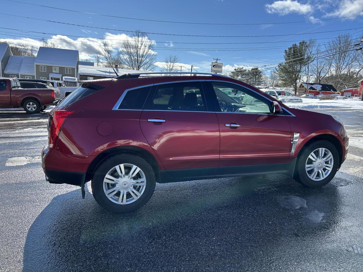 2012 Red /Tan Cadillac SRX Luxury AWD (3GYFNDE37CS) with an 3.6L V6 DOHC 24V FFV engine, 6-Speed Automatic transmission, located at 27 Main St., Norway, MD, 04268, (207) 743-0900, 44.199795, -70.530807 - Photo#2