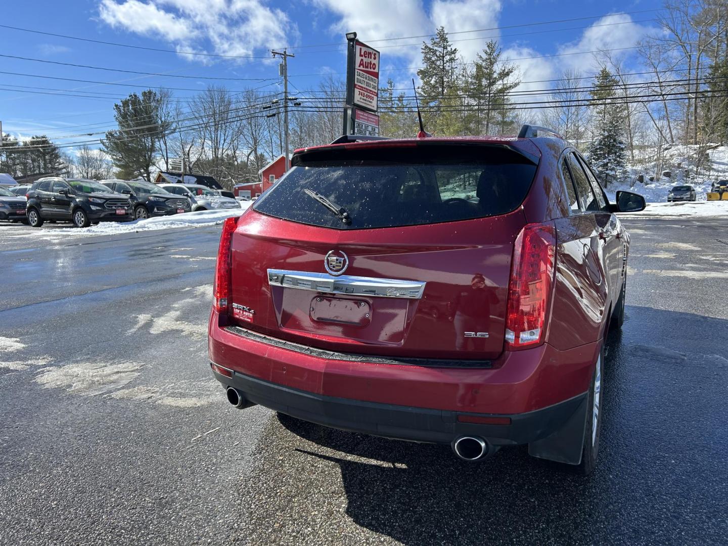 2012 Red /Tan Cadillac SRX Luxury AWD (3GYFNDE37CS) with an 3.6L V6 DOHC 24V FFV engine, 6-Speed Automatic transmission, located at 27 Main St., Norway, MD, 04268, (207) 743-0900, 44.199795, -70.530807 - Photo#3